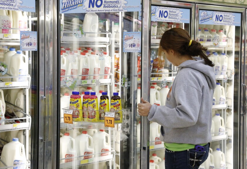 Milk in a store's refrigerated section