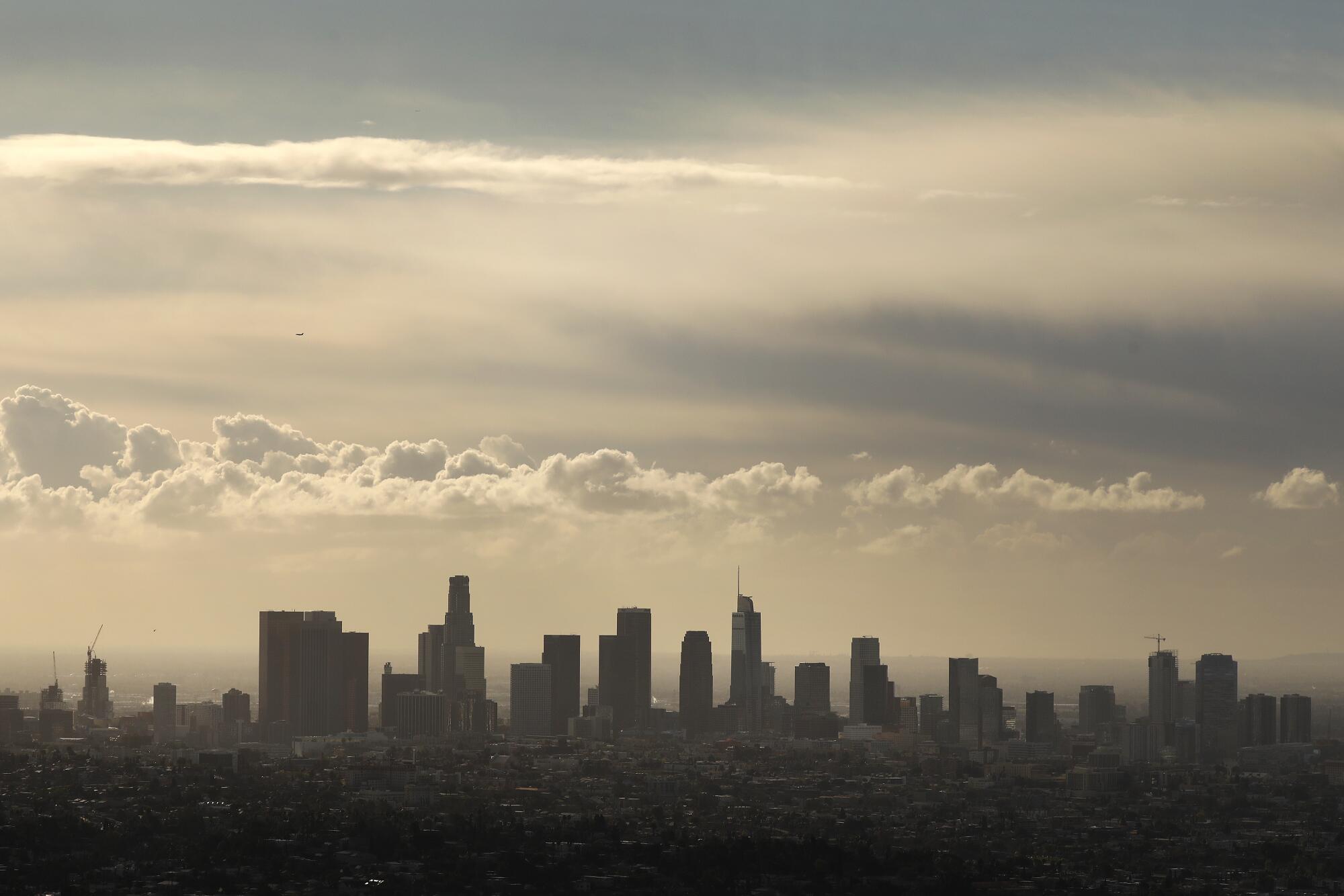 Clouds drift past the downtown L.A. skyline 