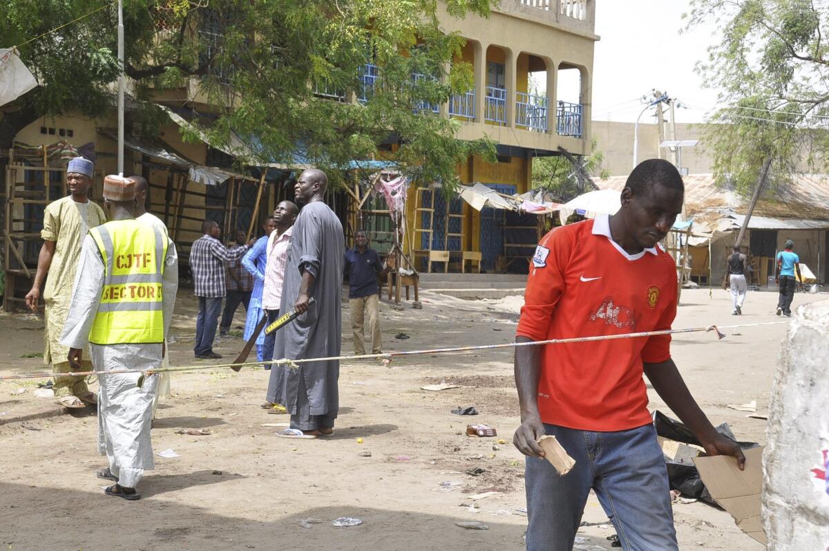 The site of a suicide bomb explosion at a market in Maiduguri, Nigeria, on Saturday.