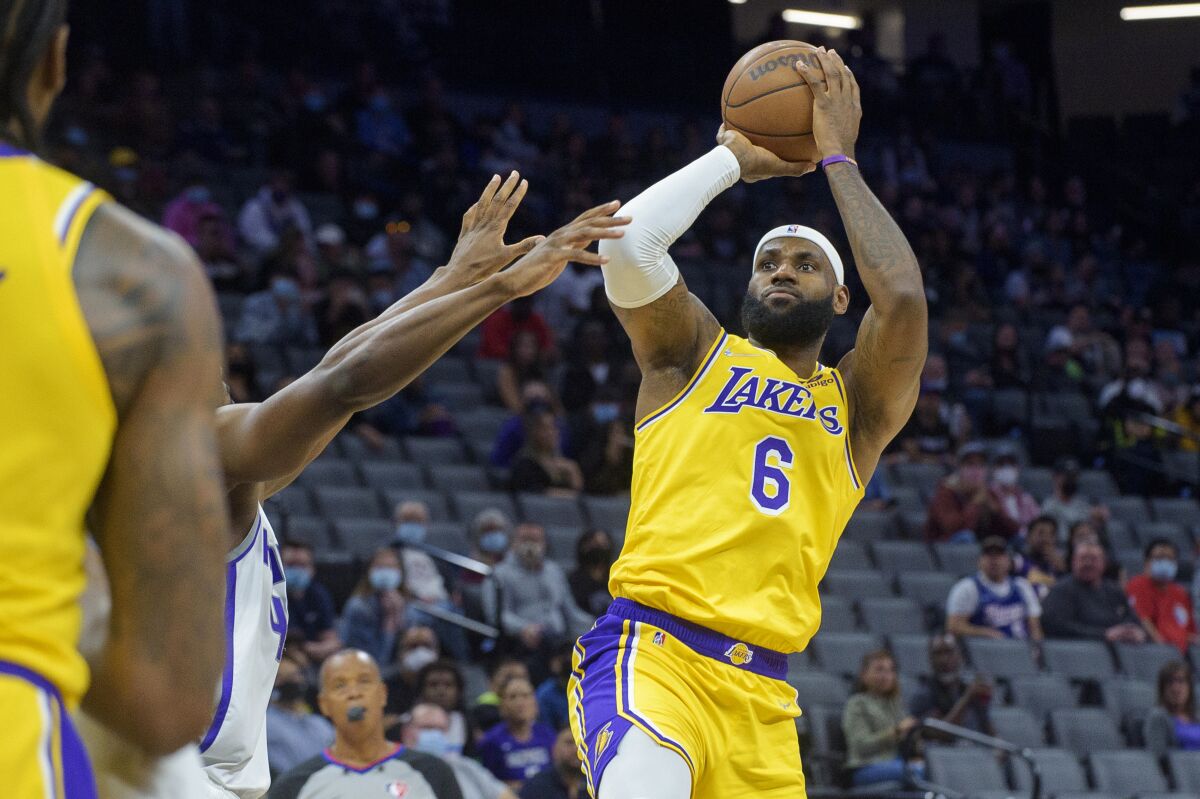 Lakers forward LeBron James shoots against the Sacramento Kings.