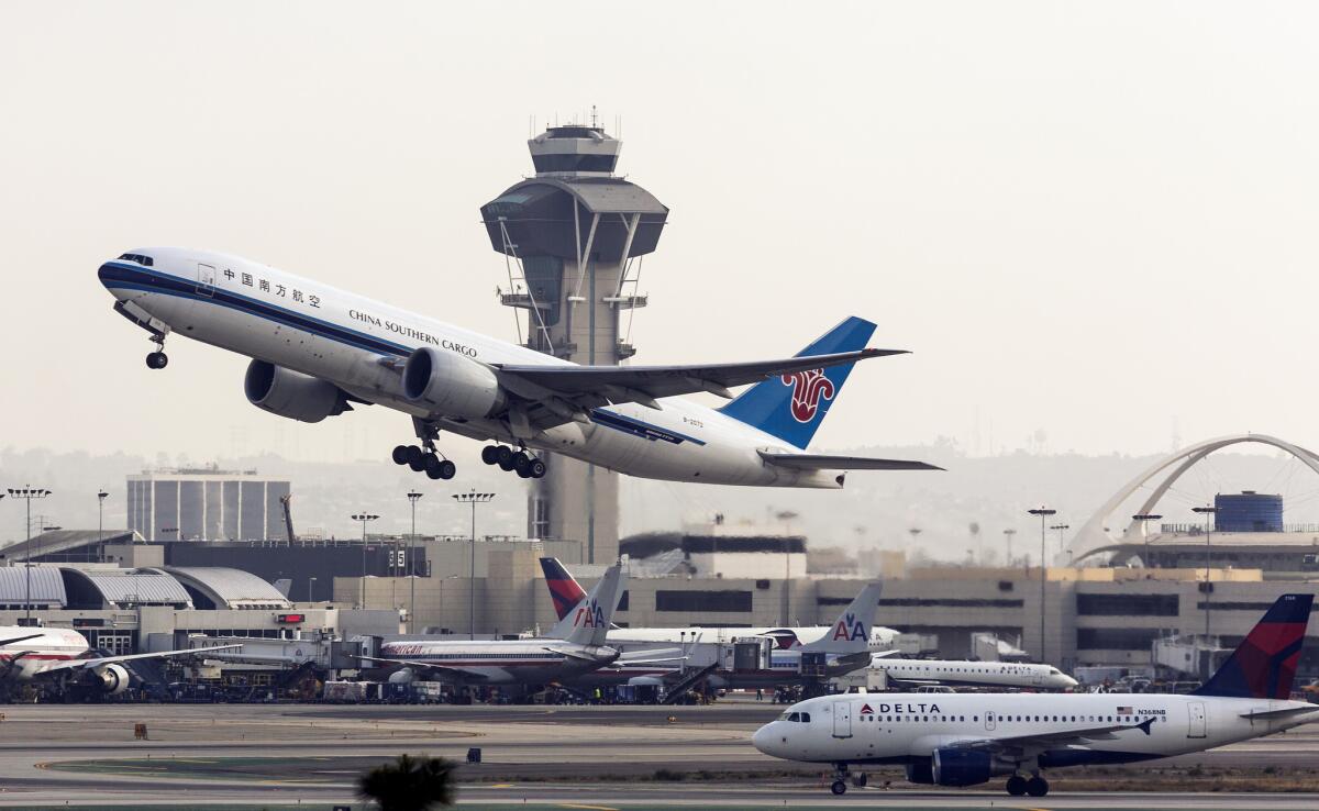 A China Southern Cargo jet takes off from Los Angeles International Airport. Although LAX remains a significant source of air pollution in the Los Angeles Basin, researchers found that efforts by the airport and airlines to reduce emissions have been working.
