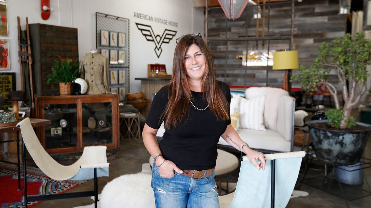 Owner JoAnn Sarvak poses in her showroom, filled with vintage items from the '50s, '60s and '70s, at American Vintage House in Newport Beach. Sarvak is a Newport Beach resident who always had a love for "picking" and turned her passion into a retail business.