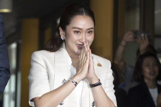 Leader of the Pheu Thai party, Paetongtarn Shinawatra arrives at the party's headquarters in Bangkok, Thailand, Friday, Aug. 16, 2024. (AP Photo/Wason Wanichakorn)