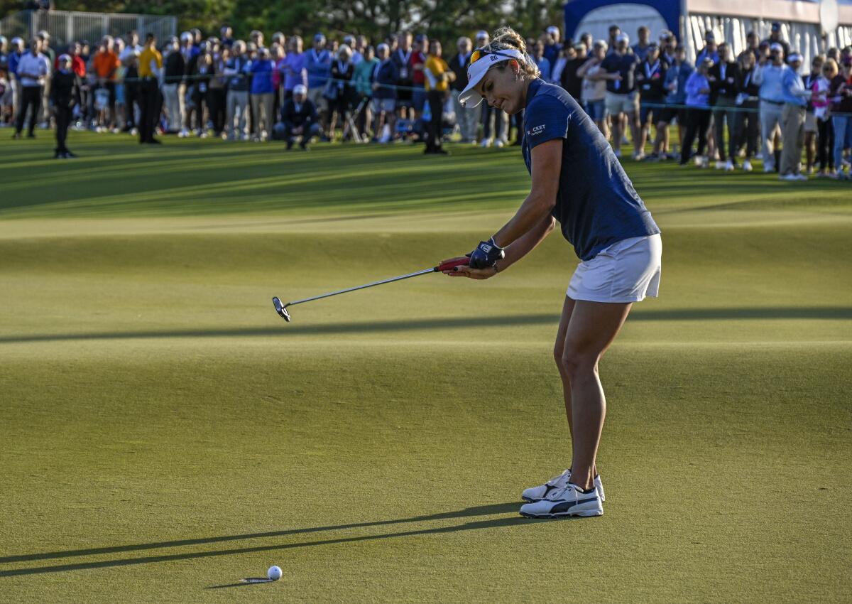Lexi Thompson misses a birdie putt on the 18th green during the first hole of sudden-death after a four-way tie in the final round of the LPGA Pelican Women's Championship golf tournament at Pelican Golf Club, Sunday, Nov. 14, 2021, in Belleair, Fla. (AP Photo/Steve Nesius)