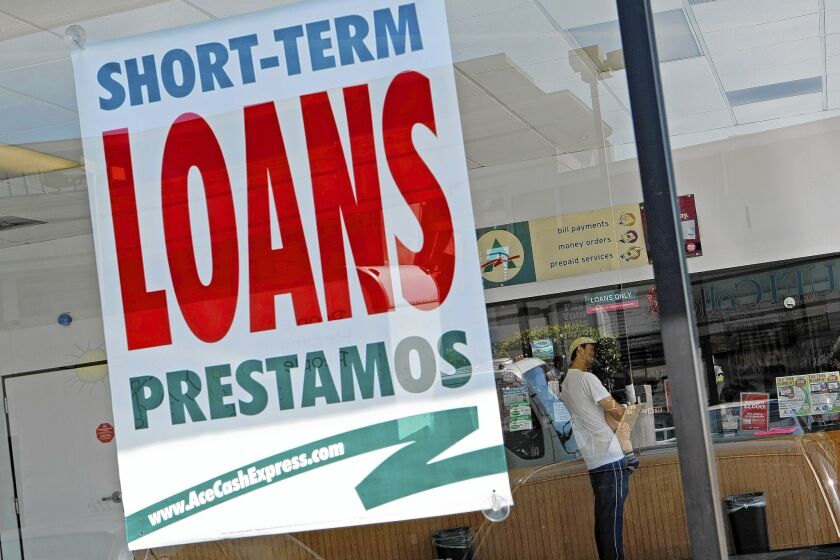 The Consumer Financial Protection Bureau accused Ace Cash Express of using illegal tactics to pressure borrowers with overdue payday loans into taking out new loans to pay them off. Above, a store in Van Nuys in 2010.
