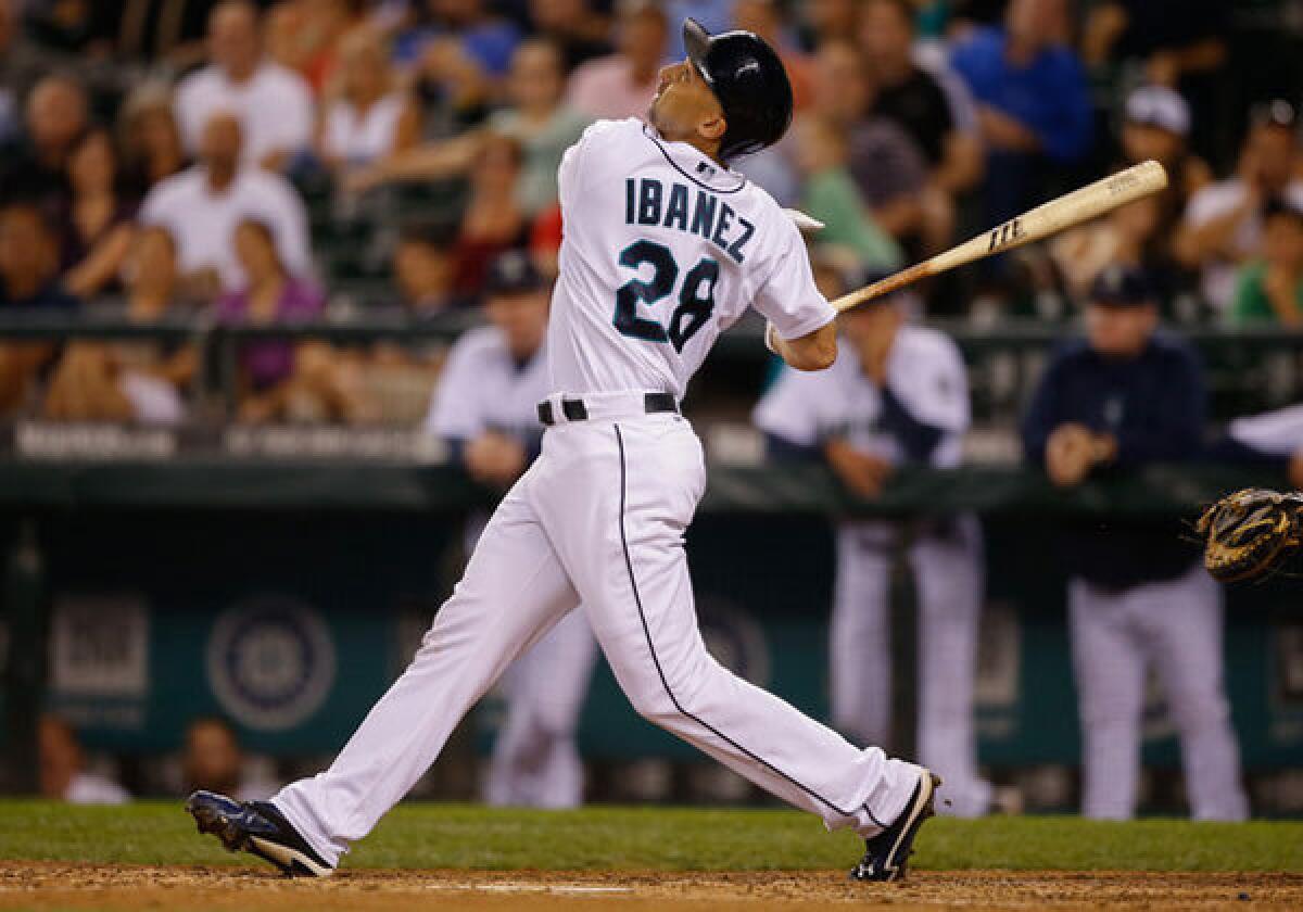 Raul Ibanez takes a swing for the Seattle Mariners in September.