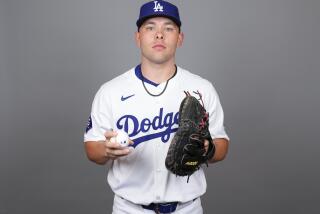 This is a 2024 photo of catcher Dalton Rushing of the Los Angeles Dodgers baseball team. This image reflects the active roster as of Wednesday, Feb. 21, 2024, when this image was taken in Phoenix. (AP Photo/Ashley Landis)