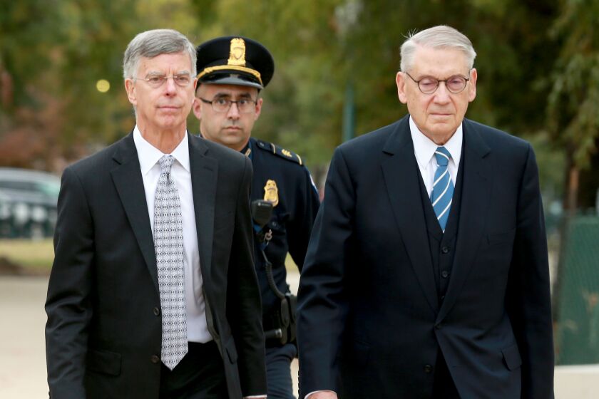 WASHINGTON, D.C.,OCTOBER 22, 2019Ñ William Taylor (left) , the top U.S. diplomat to Ukraine who called it "crazy" that the United States would condition the release of security assistance to Ukraine on opening an investigation into Democrats, arrived at the Capitol to testify Tuesday Oct. 22, behind closed doors in the House impeachment inquiry. Taylor's testimony comes as a growing number of Republicans in Congress struggle to defend the president's actions over Ukraine and Syria. (kirk D. McKoy / Los Angeles Times)