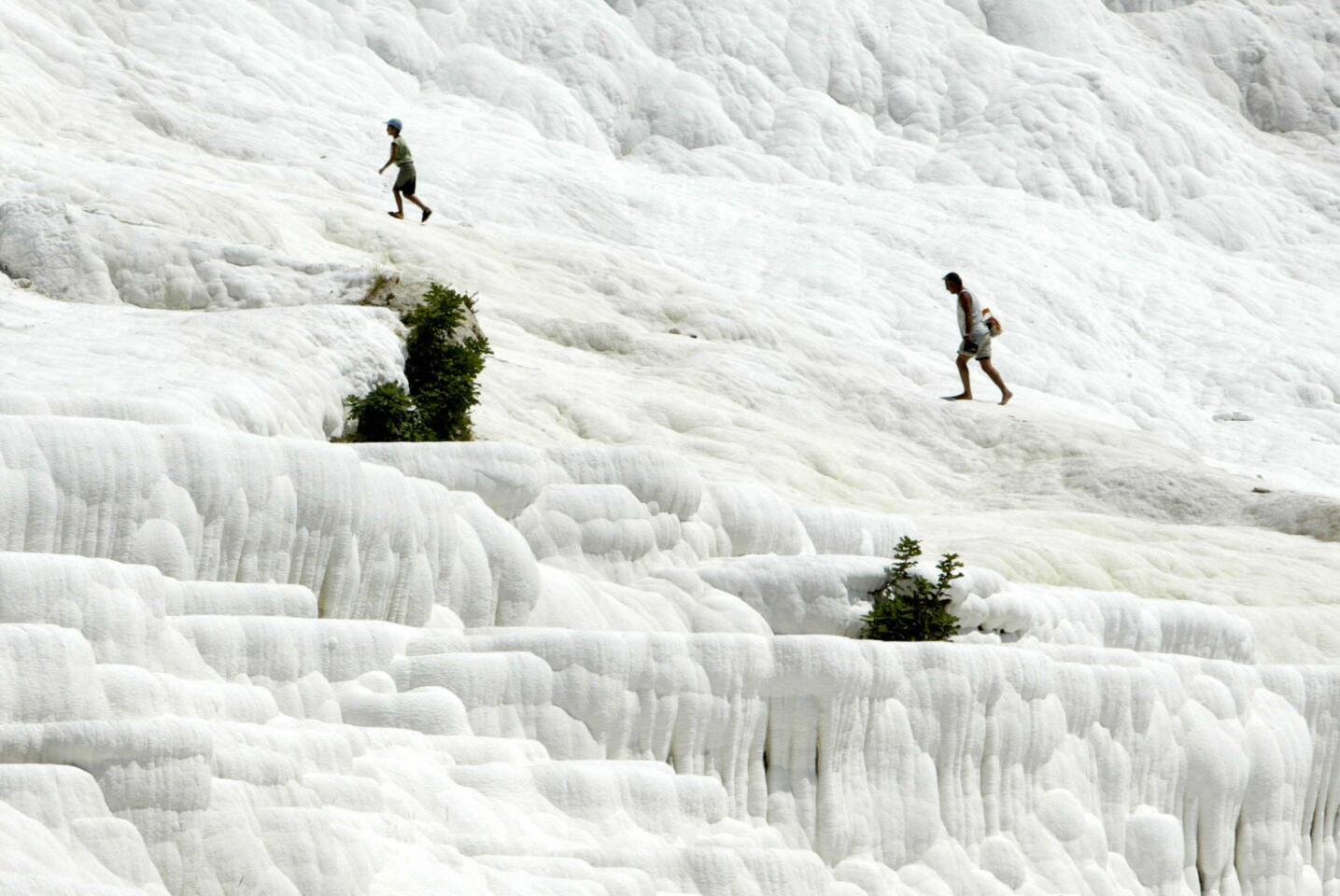 Year inscribed: 1988 Location: Turkey Pamukkale, popular since ancient times, consists of 17 hot water springs created by volcanic activity. The name itself means "Cotton Castle," which describes the fluffy-looking mineral deposits. More photos...