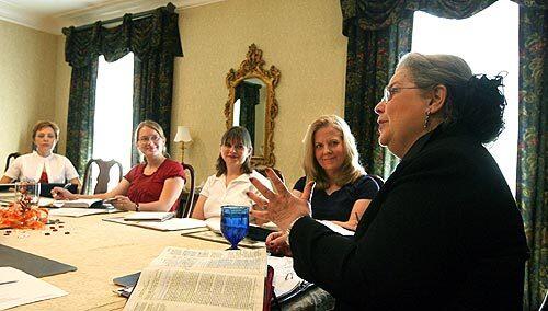 Dorothy Patterson, right, conducts a homemaking class in her dining room for students Donella Cecrle, from left, Heather Dalton, Tamara Latham and Mary Nichols. The course is part of a wider homemaking program open only to women at Southwestern Baptist Theological Seminary in Fort Worth, Texas.