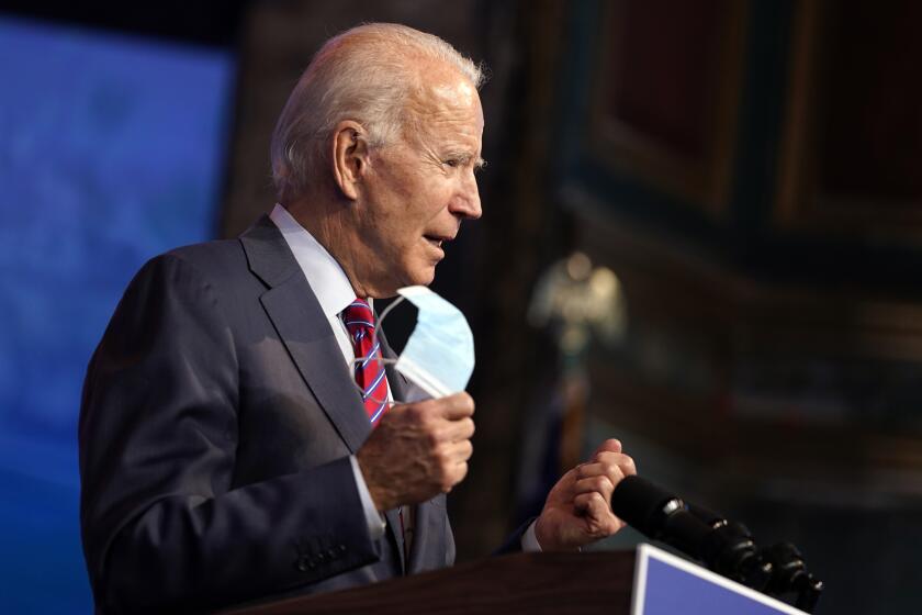 President-elect Joe Biden speaks about jobs at The Queen theater, Friday, Dec. 4, 2020, in Wilmington, Del. (AP Photo/Andrew Harnik)