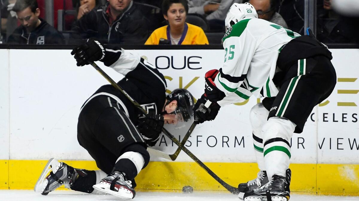 The Kings' Tanner Pearson, left, and the Dallas Stars' Brett Ritchie battle for the puck Jan. 9.