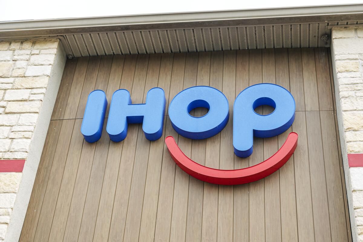 An IHOP sign outside the restaurant