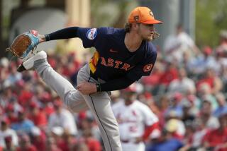 Houston Astros pitcher Josh Hader throws during the fifth inning of a spring training.