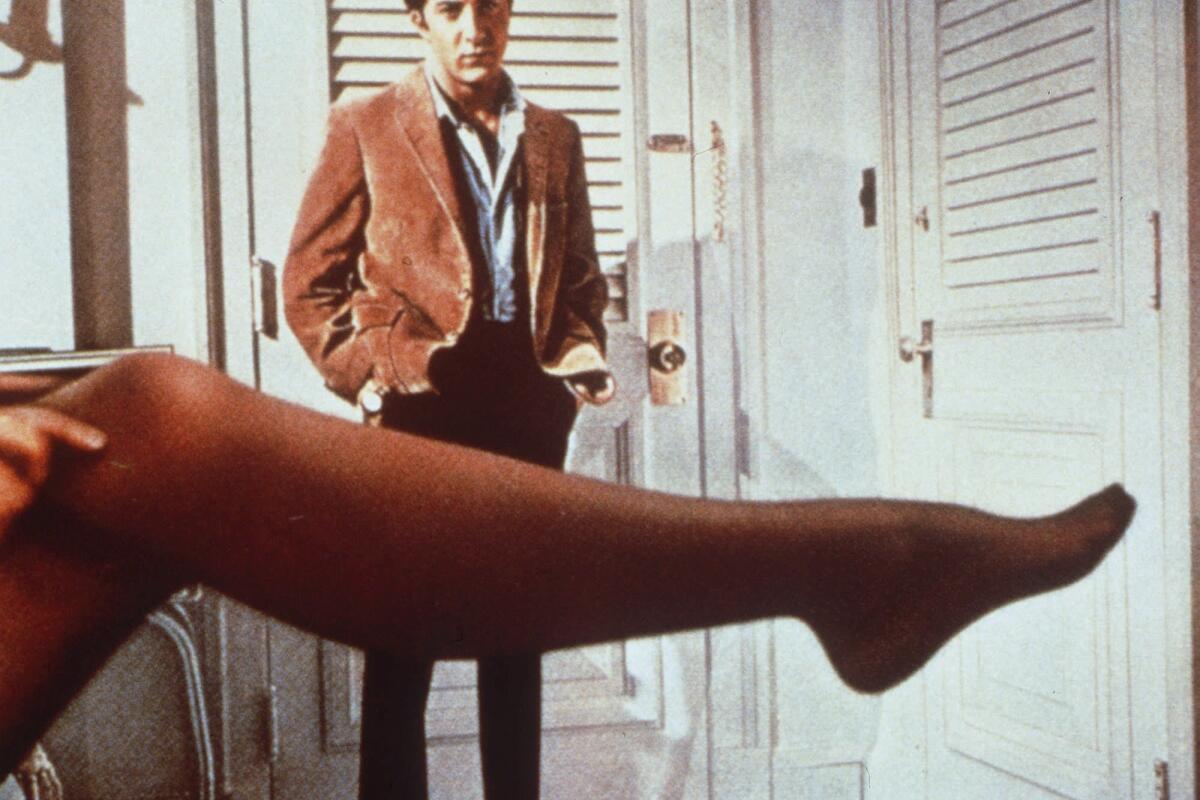 Dustin Hoffman and the stockinged leg of actress Anne Bancroft in a scene from the 1967 film "The Graduate."