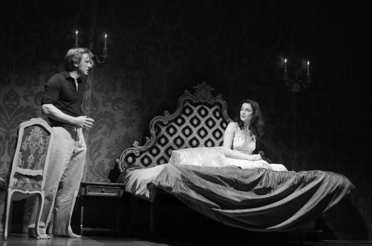 Daniel Craig, left, as Robert, and Rachel Weisz as Emma, in Harold Pinter's "Betrayal, " directed by Mike Nichols, at the Barrymore Theatre in New York.