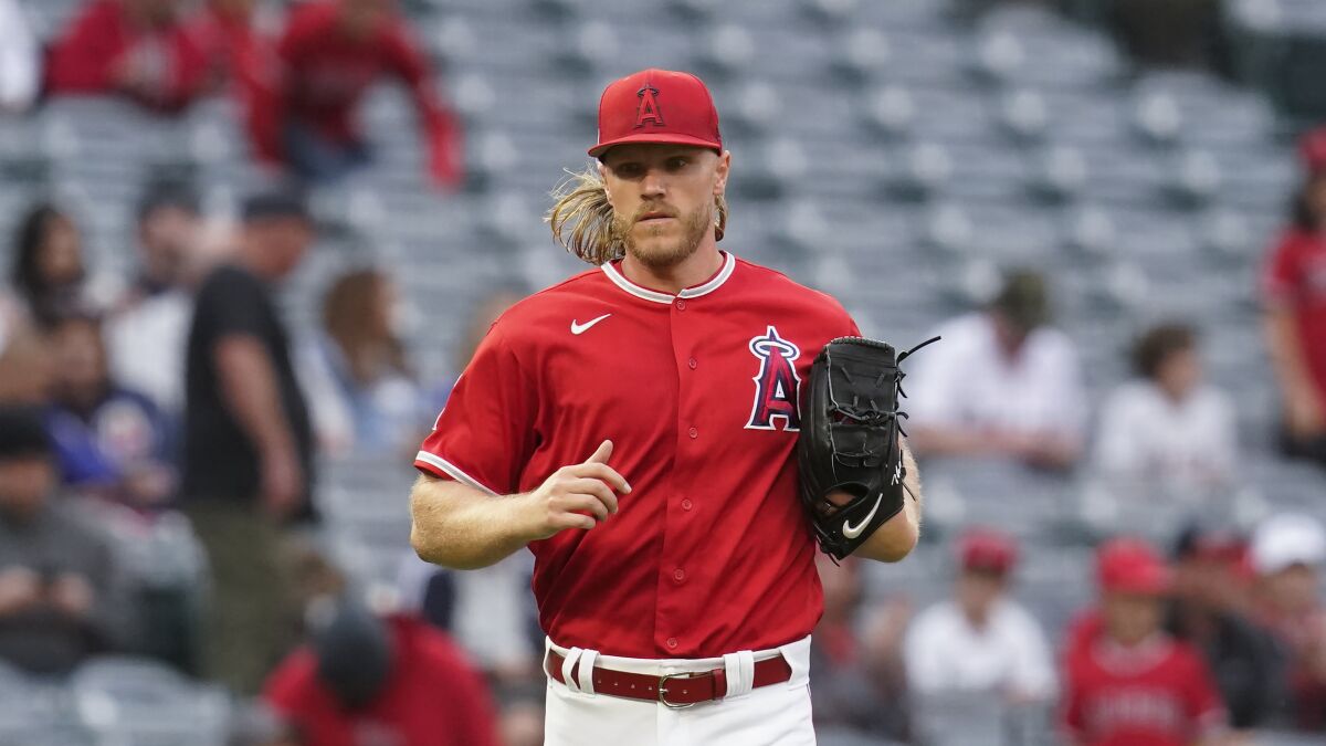 The Angels' Noah Syndergaard runs to the mound during an exhibition against the Dodgers.