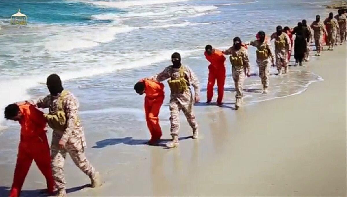 A screenshot from a video released by Islamic State militants Sunday appears to show a group of captured Ethiopian Christians before they are executed in Libya.