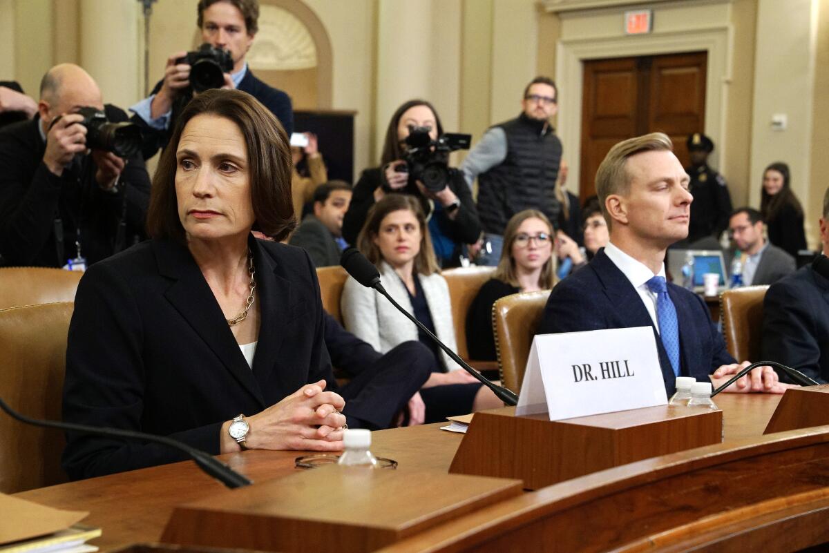 Former White House national security aide Fiona Hill and David Holmes, a U.S. diplomat in Ukraine, during their testimony to the House Intelligence Committee on Nov. 21.