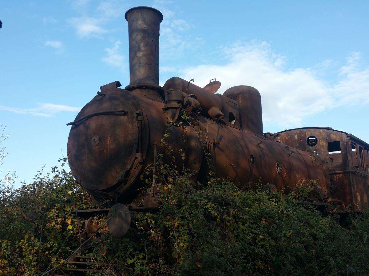 A rusting locomotive sits at the abandoned train station in Tripoli, Lebanon.