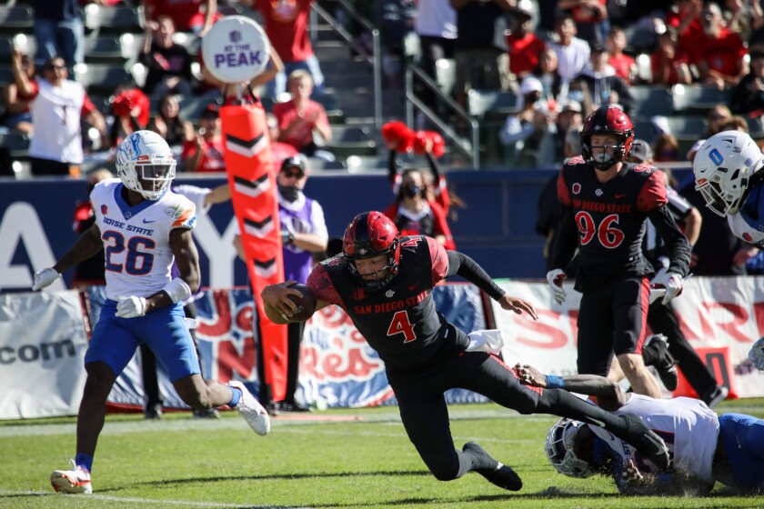 San Diego State quarterback Jordon Brookshire scores a 16-yard touchdown on a run against Boise State.