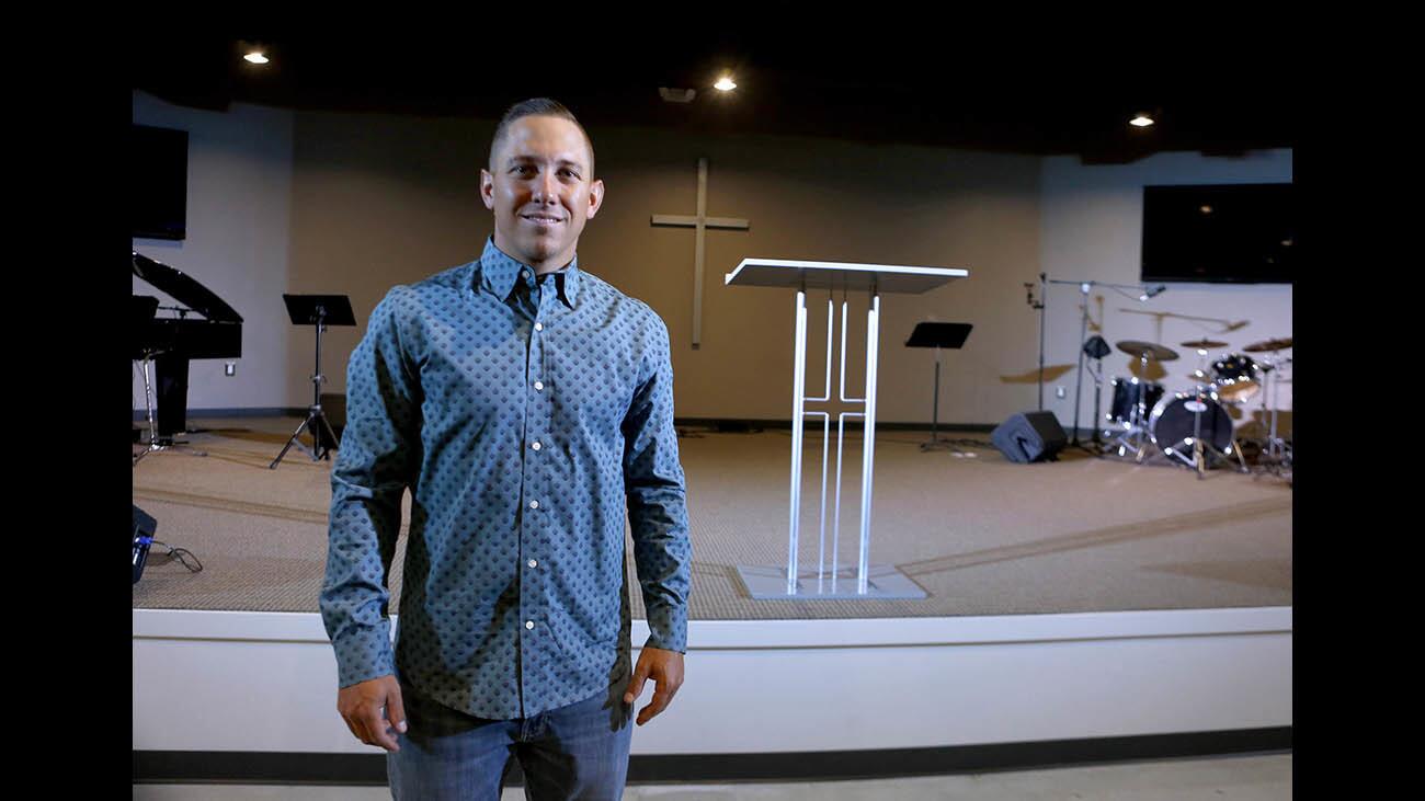 City Light Baptist Church lead pastor Nick Reed, 32 of Burbank, stands at the new facility's main sanctuary, on the 1100 block of South Victory Blvd., in Burbank, on Tuesday, Oct. 31, 2017. The church has about 300 members and moved into this new location with a 20-year lease.