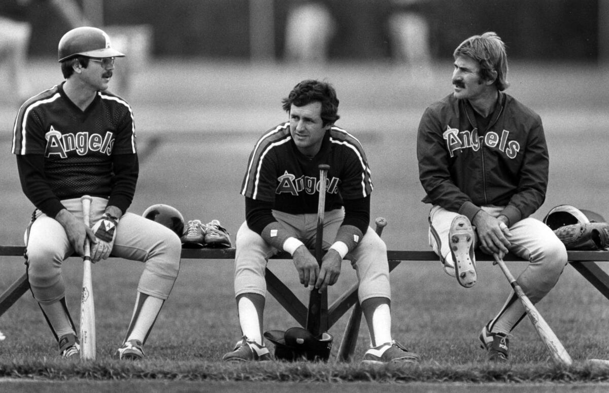 March 1983: Angels Tim Foli, left, Fred Lynn and Bobby Brich chat between batting practices during spring camp in Casa Grande, Ariz.
