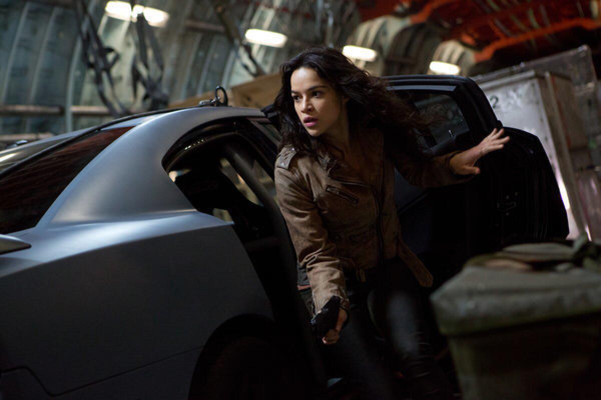 Michelle Rodriguez in a scene from "Fast & Furious 6." The actress has several writing projects in the pipeline.