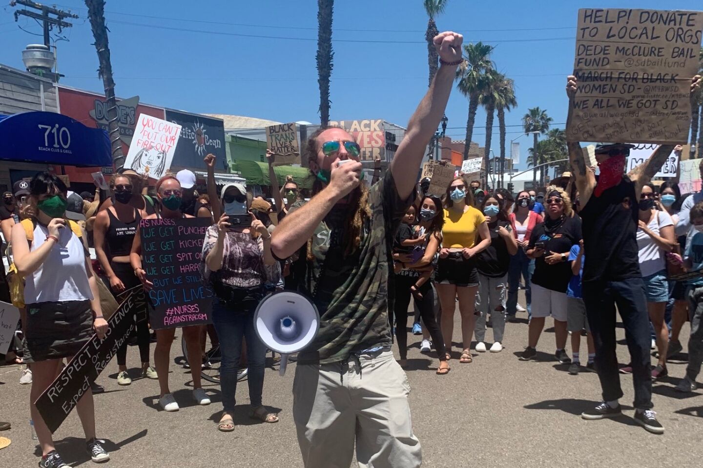 Pacific Beach Walk for Equality organizer Kai Phillips makes a statement in support of Black Lives Matter at the start of the protest June 14.