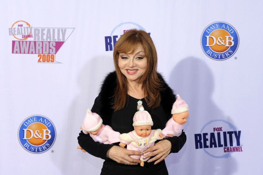 FILE - Comedian Judy Tenuta arrives at the 2009 Fox Reality Channel Really Awards in Los Angeles on Oct. 13, 2009. Tenuta, a brash standup who cheekily styled herself as the "Goddess of Love” and toured with George Carlin as she built her career in the 1980s golden age of comedy, died Thursday, Oct. 6, 2022, at age 65, according to her publicist. (AP Photo/Chris Pizzello, File)