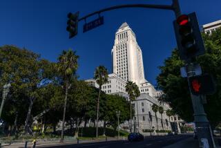 LOS ANGELES, CA - DECEMBER 02: A view of Los Angeles City Hall. Twin Towers Correctional Facility on Saturday, Dec. 2, 2023 in Los Angeles, CA. (Irfan Khan / Los Angeles Times)