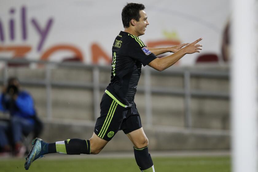 Mexico forward Erick Torres celebrates after scoring the go-ahead goal against Honduras during the second half of a CONCACAF Olympic qualifying soccer match Wednesday, Oct. 7, 2015, in Commerce City, Colo. Mexico won 2-1. (AP Photo/David Zalubowski)