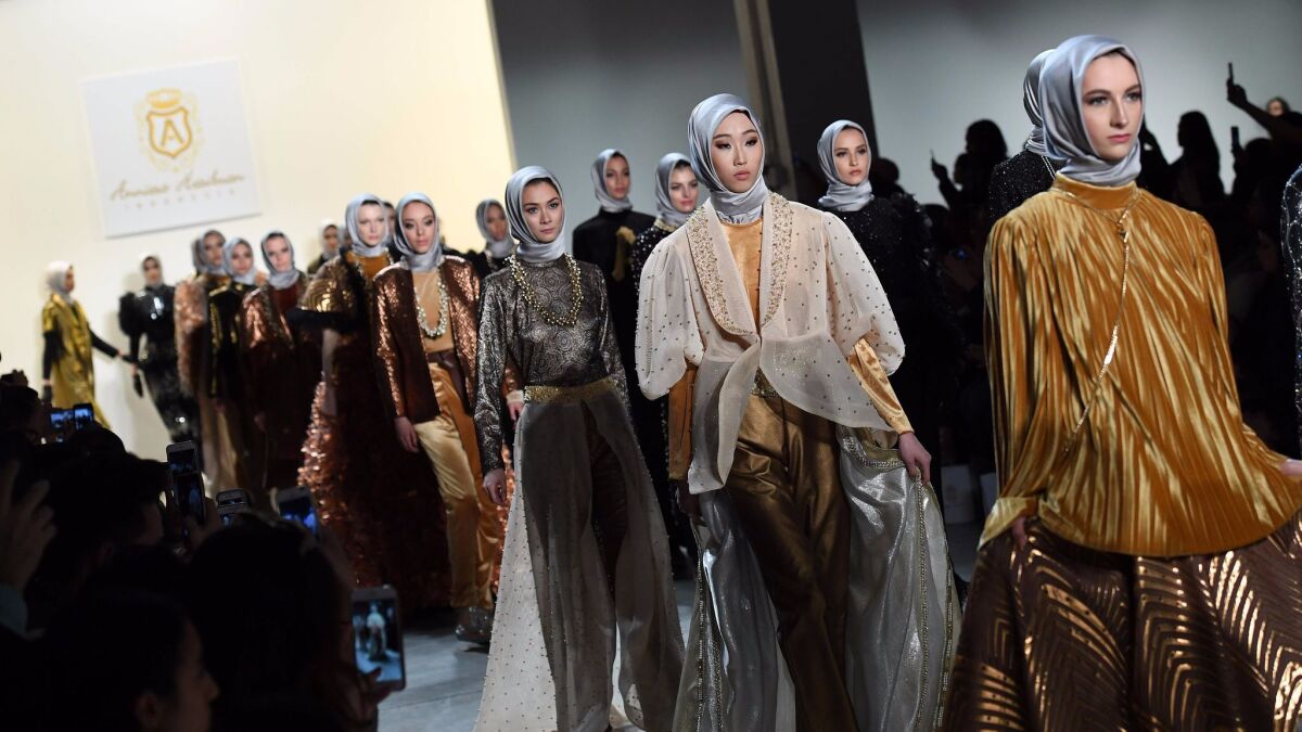 Models walk the runway for the Anniesa Hasibuan show during New York Fashion Week in New York City on Feb. 14.