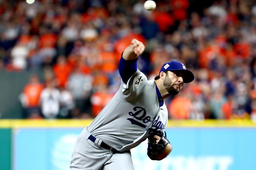 HOUSTON, TX - OCTOBER 28: Brandon Morrow #17 of the Los Angeles Dodgers pitches during game four of the 2017 World Series against the Houston Astros at Minute Maid Park on October 28, 2017 in Houston, Texas. (Photo by Ezra Shaw/Getty Images) ** OUTS - ELSENT, FPG, CM - OUTS * NM, PH, VA if sourced by CT, LA or MoD **