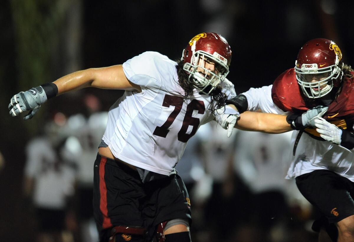 USC offensive tackle Nate Guertler hasn't let his walk-on status prevent him from being a hero to his younger brother.