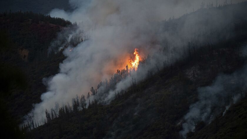 The Ferguson fire burns a hillside on Sunday near Yosemite National Park.