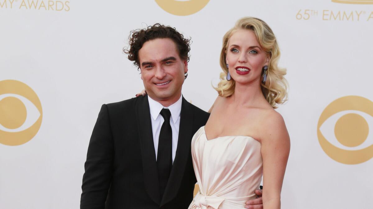 Johnny Galecki and Kelli Garner at the Emmy Awards show on Sept. 22, 2013.