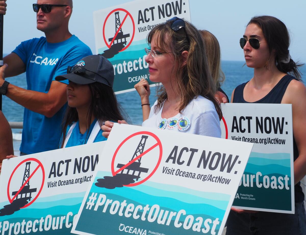 U.S. Reps. Mike Levin and Scott Peters were among the speakers at a news conference in Encinitas to denounce offshore drilling off the coast.