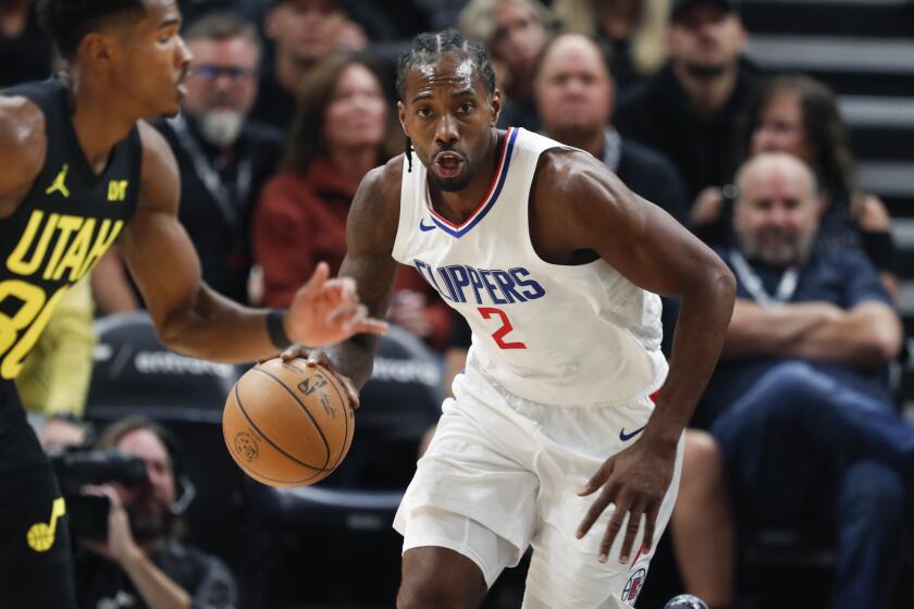 SALT LAKE CITY, UT - OCTOBER 27: Kawhi Leonard #2 of Los Angeles Clippers rushes the ball up.