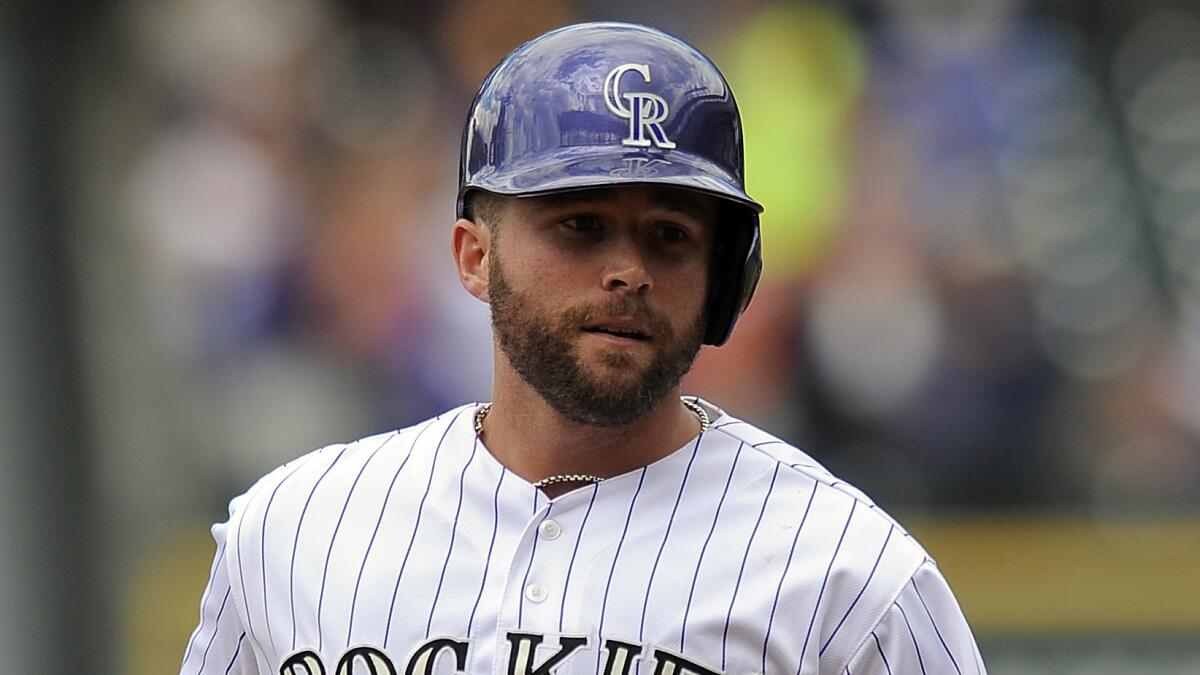 Colorado Rockies catcher Jackson Williams rounds the bases after hitting a three-run home run against the San Diego Padres on Sept. 7.