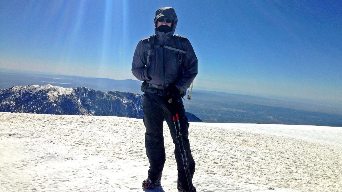 Frigid wind whips across the summit of Mt. San Antonio, aka "Mt. Baldy" during a hike by Times staff writer Geoffrey Mohan and his son. The trail they took is now closed, along with five others, after two hikers slipped and fell to their deaths in the area.