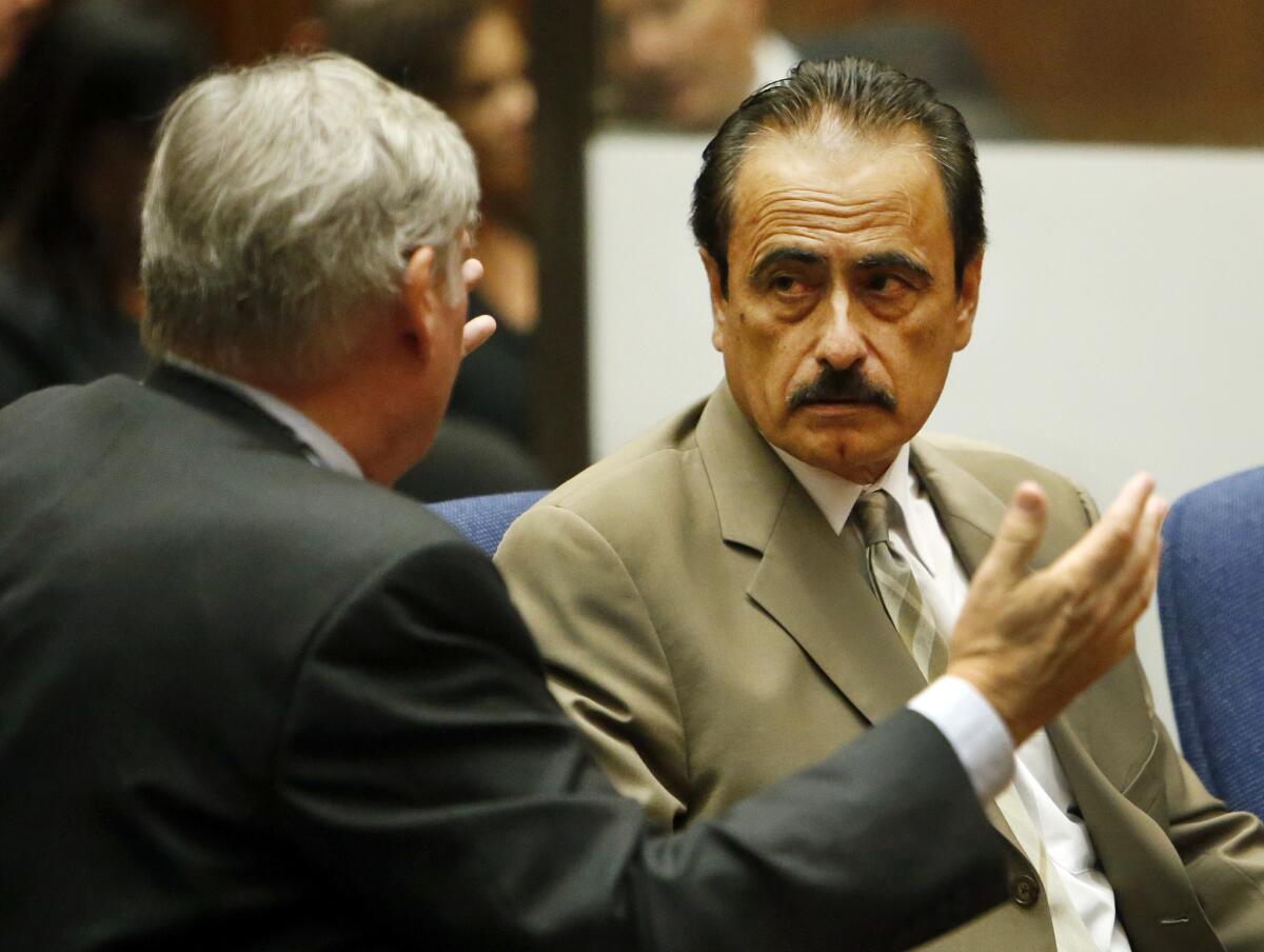 Former Los Angeles City Councilman Richard Alarcon, right, and his attorney Richard P. Lasting in Los Angeles Superior Court in July.