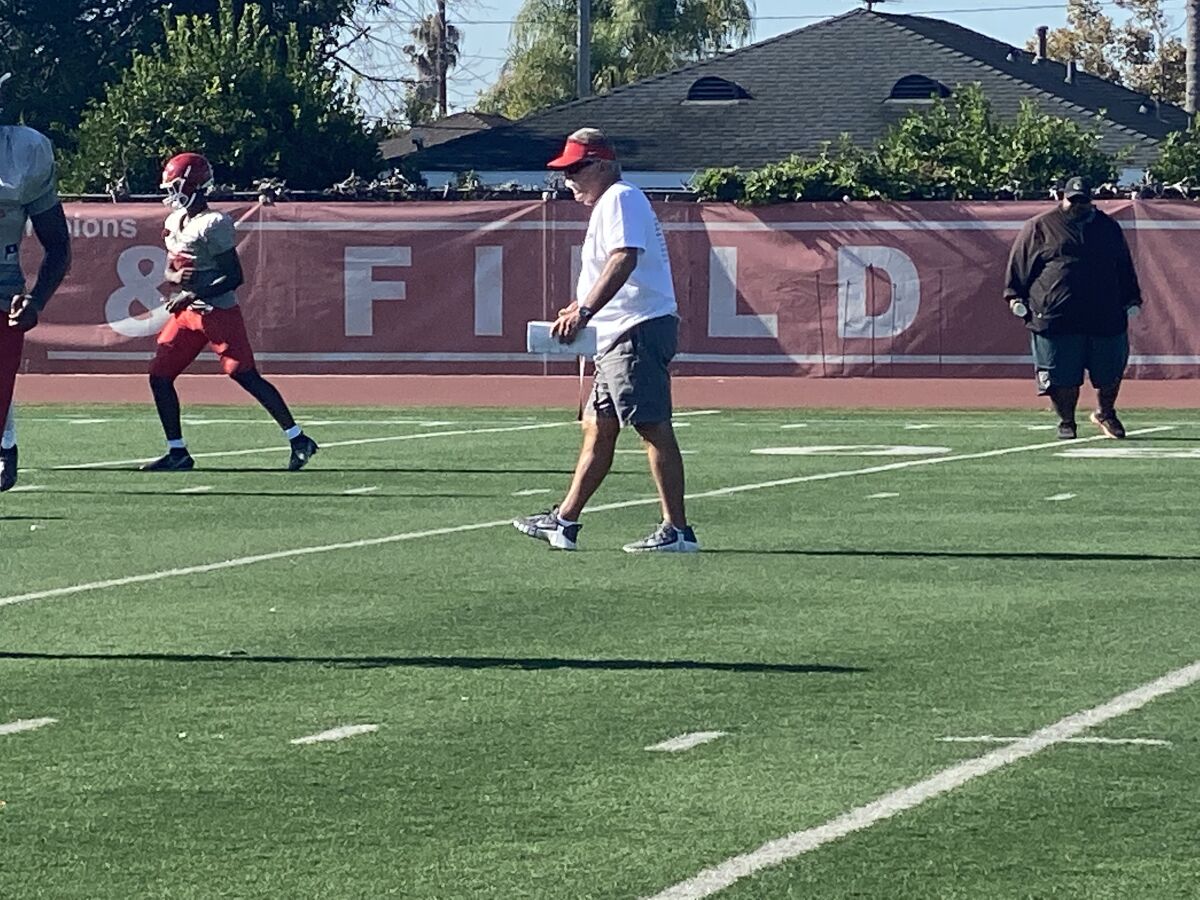 Mater Dei coach Bruce Rollinson during practice this week. He's trying to find out about NIL rules for his top athletes.