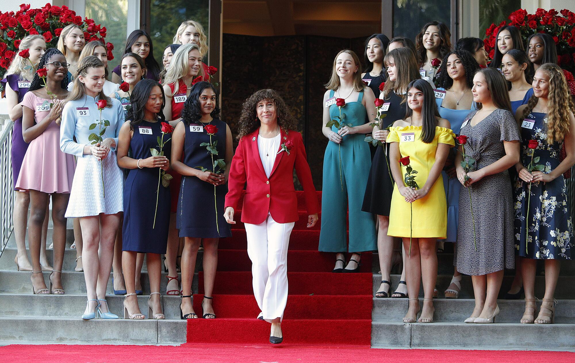 Laura Farber, president of the 2020 Tournament of Roses, steps to the stage to announce the 2020 Royal Court. 