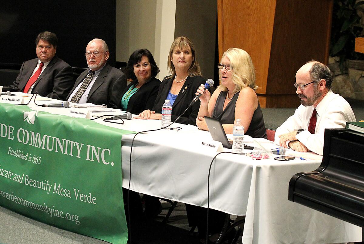 Candidates for Newport-Mesa Unified School District board of education Michael Collier, Walt Davenport, Lisa Manfredi, Charlene Metoyer, Vicki Snell, and Steve Smith, left to right, introduce themselves during first Mesa Verde Community Inc. forum meeting at Mesa Verde Methodist Church on Oct. 8.