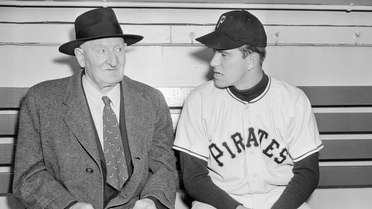 Paul Pettit, right, gets a few tips about Forbes Field from baseball great Honus Wagner before a game April 15, 1951.