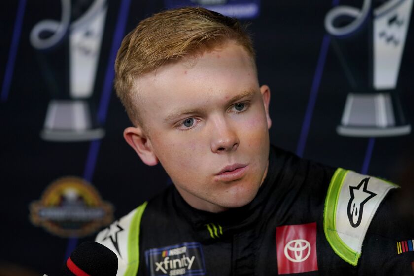 FILE - NASCAR Xfinity Series auto racing driver Ty Gibbs speaks during the NASCAR Championship media day, Thursday, Nov. 3, 2022, in Phoenix. Ty Gibbs on Thursday, Dec. 1, declined to discuss the death of his father hours after the NASCAR driver clinched the Xfinity Series championship last month. (AP Photo/Matt York, File)
