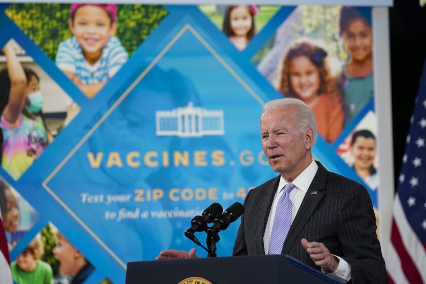 FILE - President Joe Biden talks about the newly approved COVID-19 vaccine for children ages 5-11 from the South Court Auditorium on the White House complex in Washington, Wednesday, Nov. 3, 2021. A federal judge has blocked President Joe Biden’s administration from enforcing a COVID-19 vaccine mandate for employees of federal contractors, the latest in a string of victories for Republican-led states pushing back against Biden’s pandemic policies. (AP Photo/Susan Walsh, File)