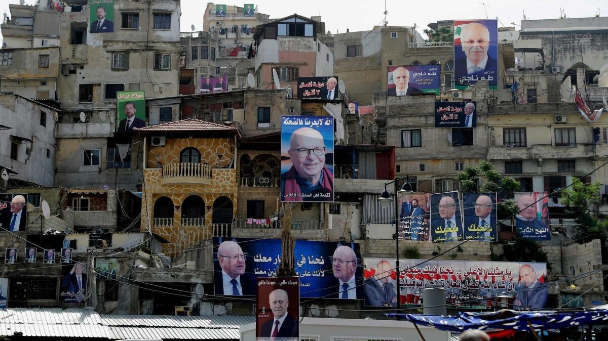 Posters of candidates dominate the landscape in Lebanese city of Tripoli.
