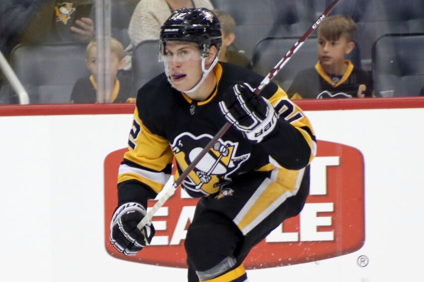 FILE - Pittsburgh Penguins' Sam Poulin (22) plays against the Columbus Blue Jackets in a preseason NHL hockey game, on Sept. 19, 2019, in Pittsburgh. Poulin is taking a leave of absence from the club's American Hockey League affiliate in Wilkes-Barre/Scranton, The Penguins announced on Wednesday, Dec. 7, 2022. (AP Photo/Keith Srakocic, File)